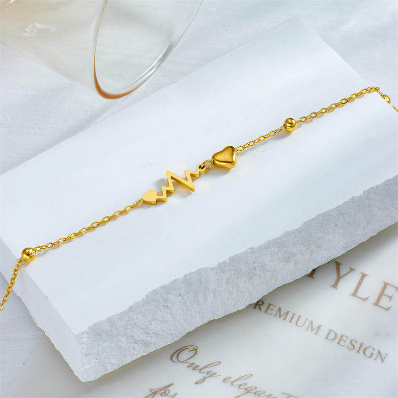 Pulse of Love Bracelet – Gold-Tone Heartbeat