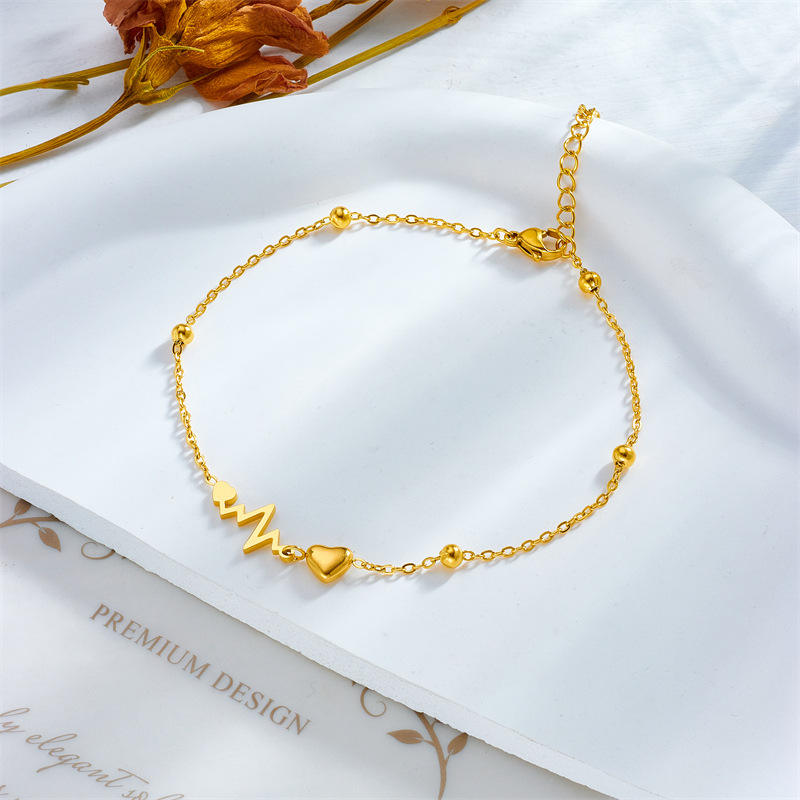 Pulse of Love Bracelet – Gold-Tone Heartbeat
